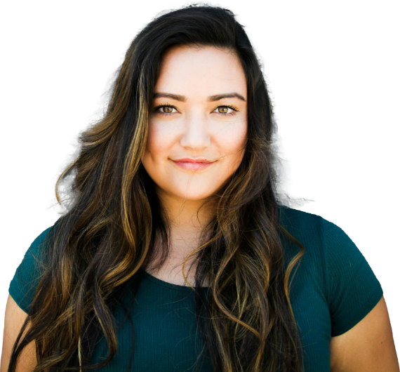 A woman with long, wavy brown hair and a green top smiles gently against a black background.